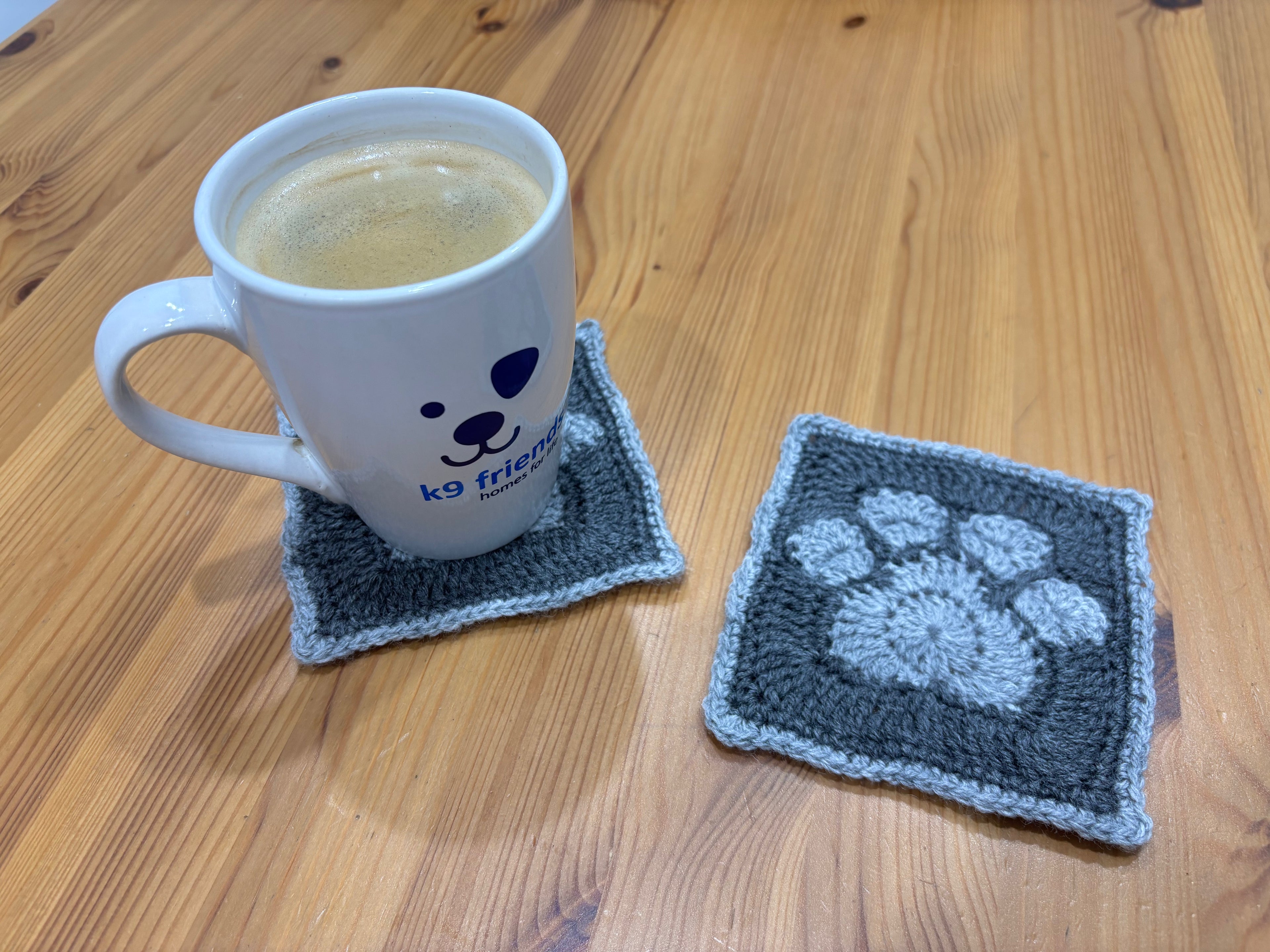Set of 2 coasters in assorted colors hand made by the volunteers at K9 friends